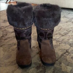 Brown Coach brand boots with fur